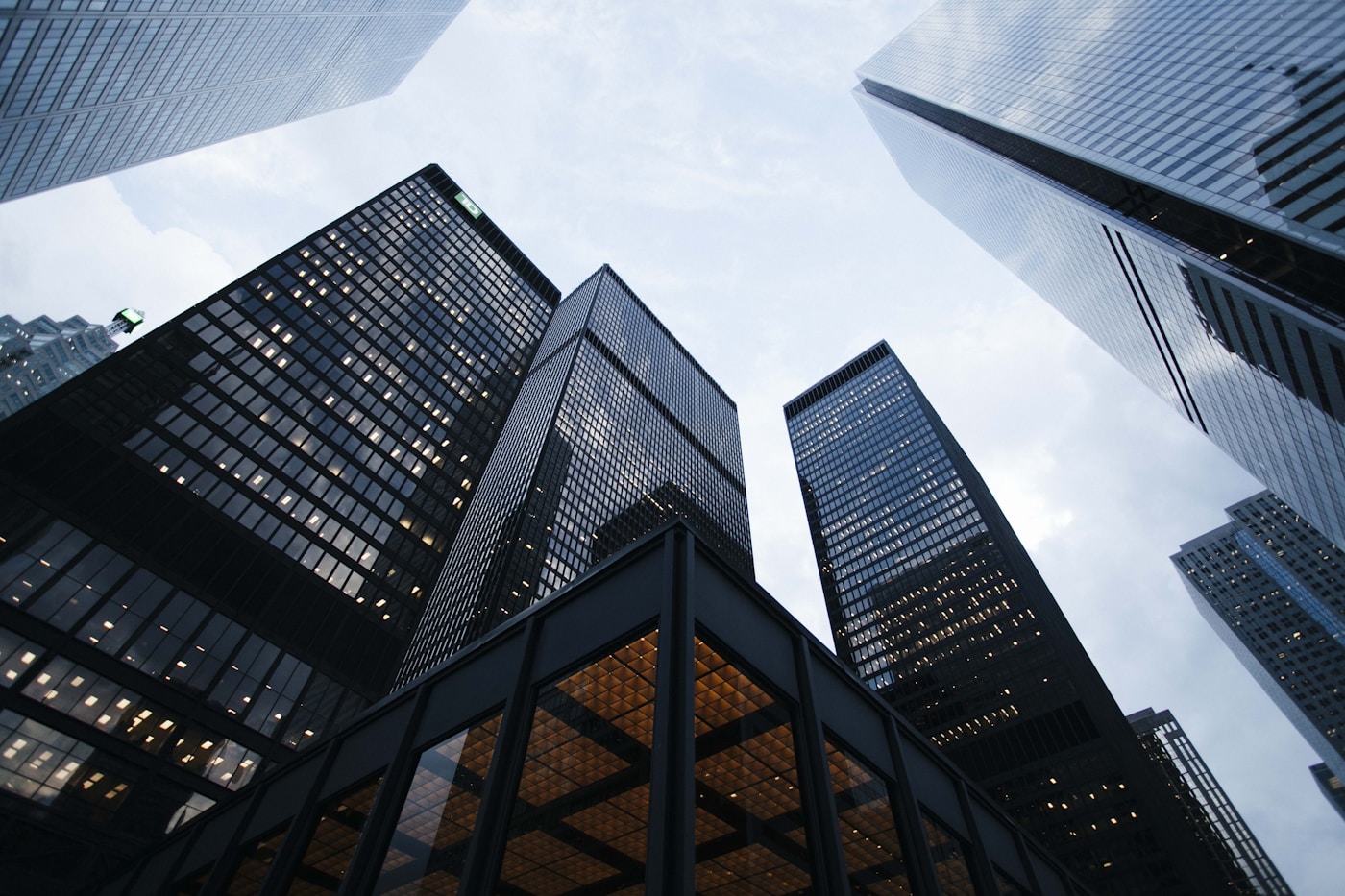 Looking up at contemporary glass office towers